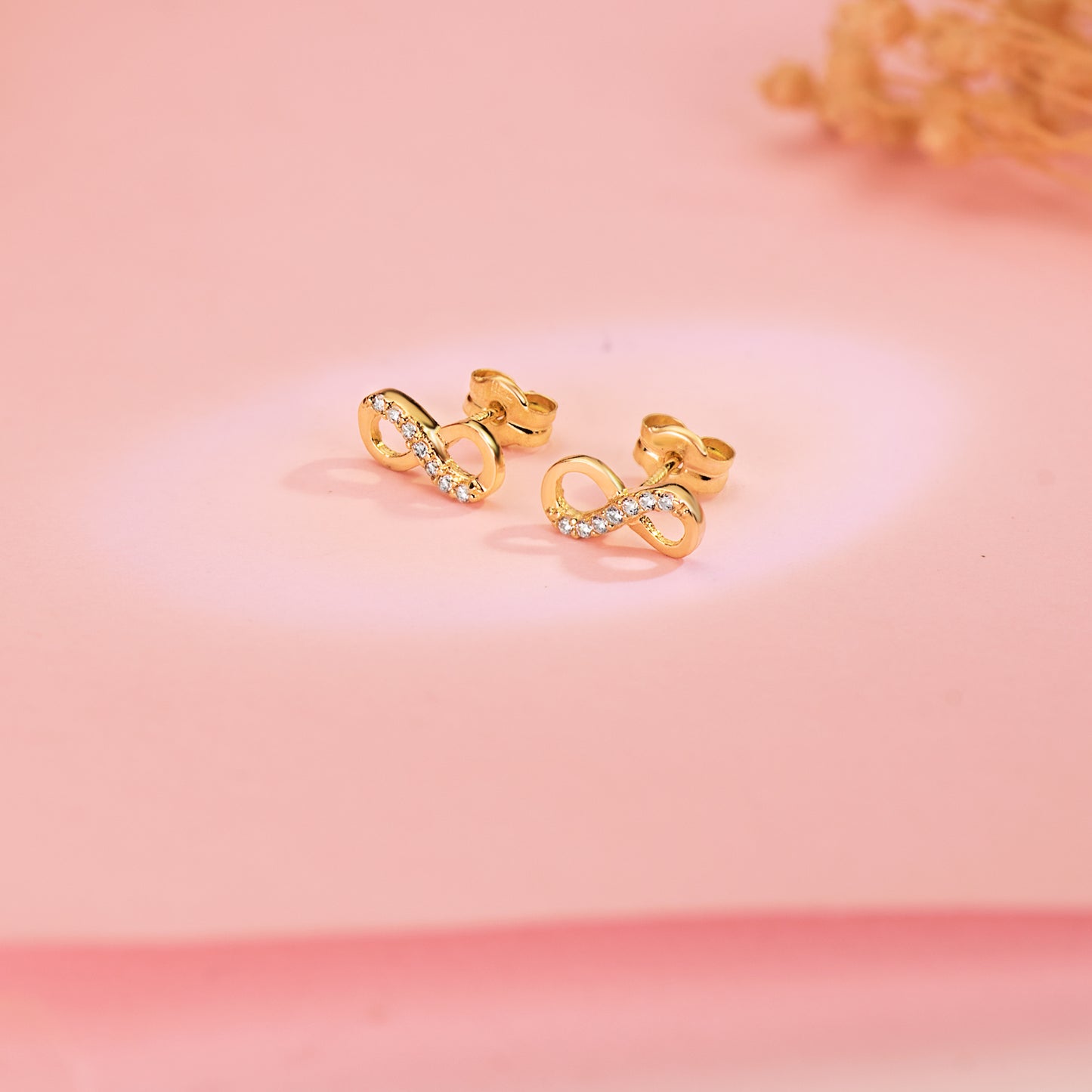 18K PENDIENTES ORO AMARILLO INFINITO CON CIRCONITAS. 9,5 X 4 MM. CIERRE PRESION